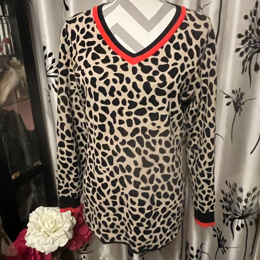 Lemon Way leopard print sweater with red and black trim on sleeves and neck.
